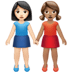 👩🏻‍🤝‍👩🏽 women holding hands: light skin tone, medium skin tone display on Apple